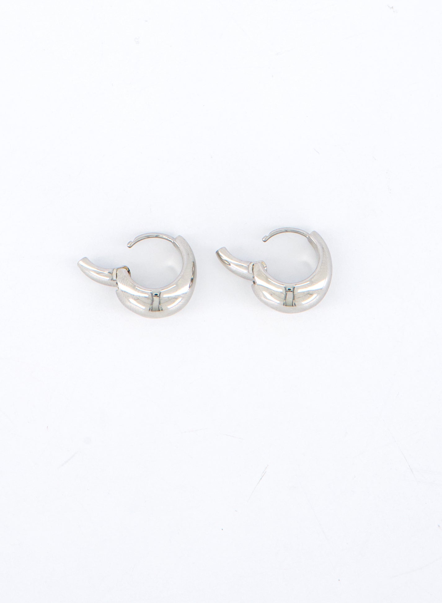 The Luna Curve One-Touch Hoop Earrings